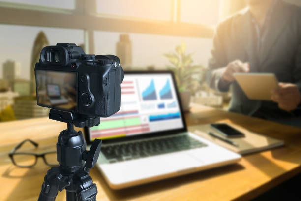 istock vlogger using  laptop  sharing her content making recording video for her vlog trends 1015226484