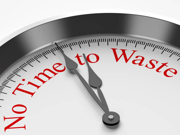istock A silver clock that says No time to waste 1015226732