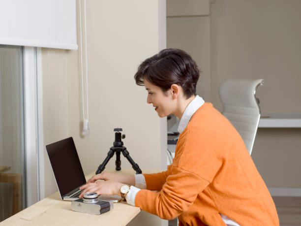 istock Female photographer in studio 1015237584