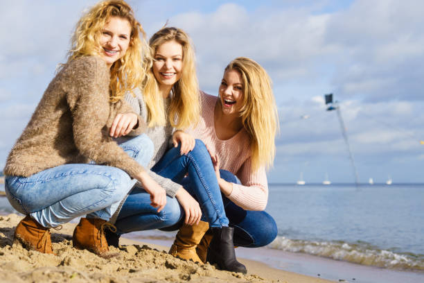 istock Three fashionable models outdoor 1015246570