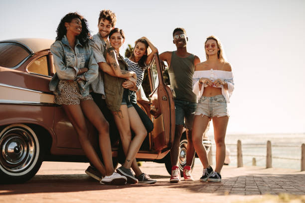 istock Diverse group of friends on a summer road trip 1015263622