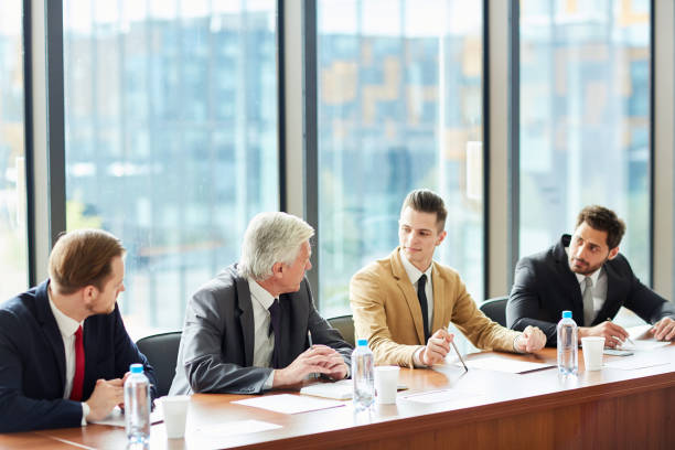 istock Modern colleagues arguing at meeting 1015264252