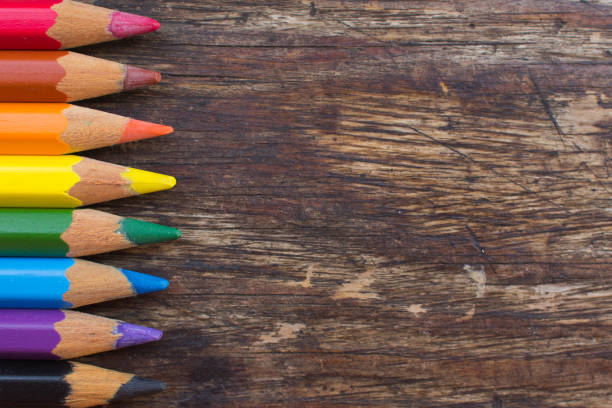 istock Color pencils on a wooden table 1015264354