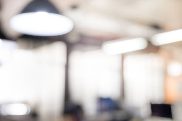 istock Blurred abstract image of modern office with electronic lamp and bokeh light. 1015266476