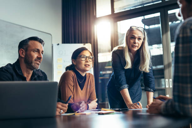 istock Business team brainstorming in conference room 1015267210