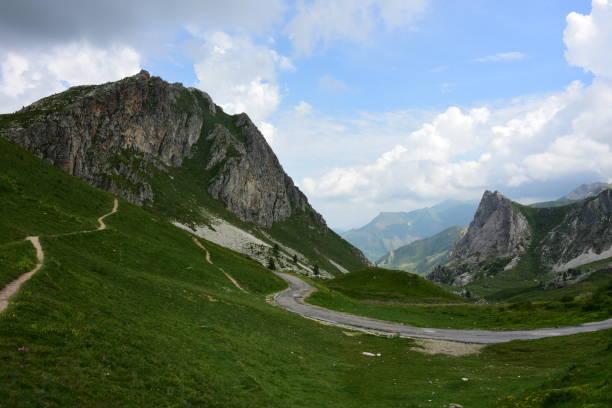 istock road in the mountains with clouds 1015281278