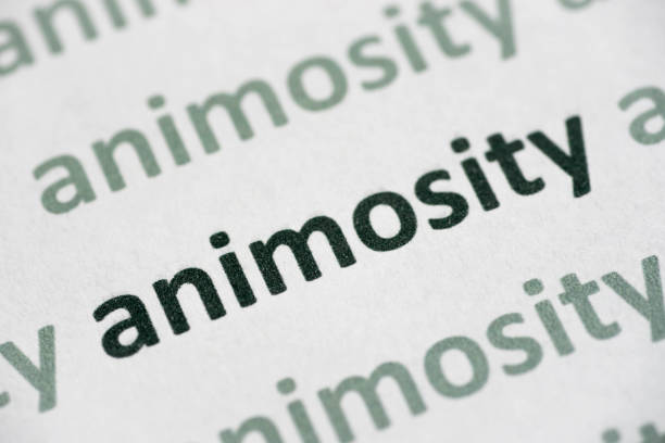 word animosity printed on paper macro word animosity printed on white paper macro animosity stock pictures, royalty-free photos & images