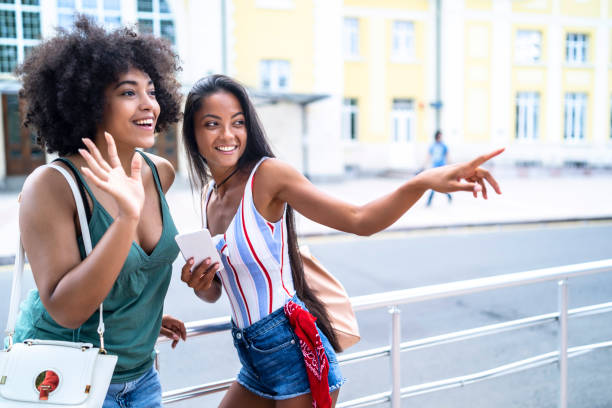 istock Woman looking for direction on street 1015287224