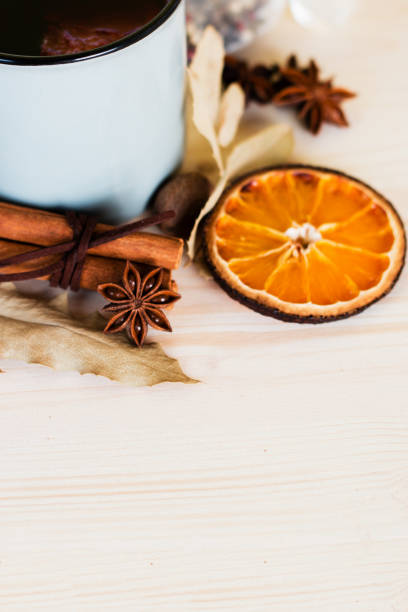 istock Autumn, fall leaves, hot steaming cup of glint wine 1015291622