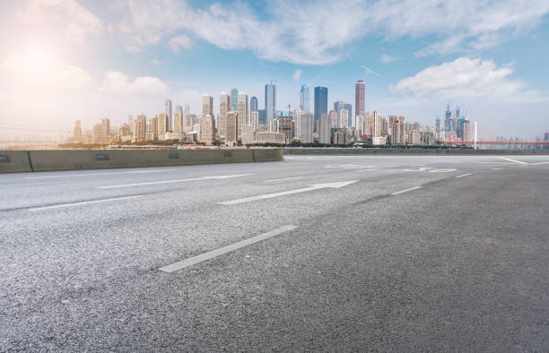 istock City square road asphalt pavement and architectural landscape skyline 1015292154