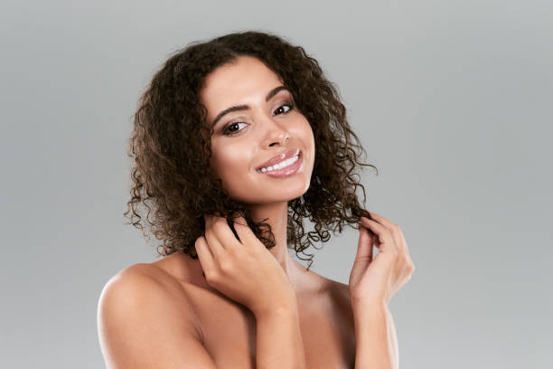 istock Her skin glows and her face radiates with a smile 1015295810