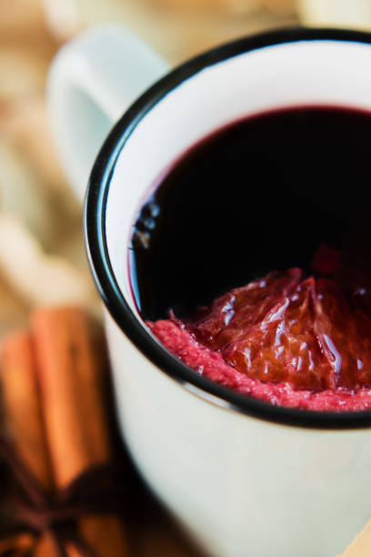 istock Autumn, fall leaves, hot steaming cup of glint wine 1015296260