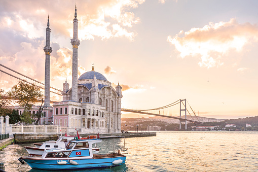 Colorful Ortakoy mosque and Bosphorus Bridge in the background.