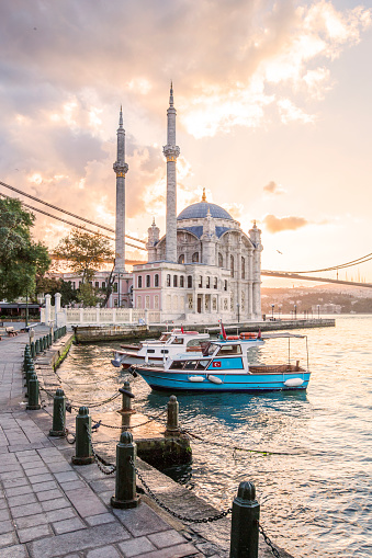 Colorful Ortakoy mosque and Bosphorus Bridge in the background.