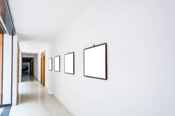 istock Long corridor with concrete floor and transparent walls in modern space 3D Render 1015308290