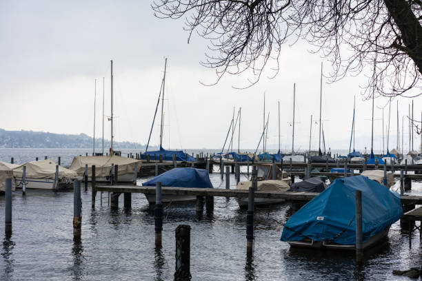 istock lake harbour scene with boats and water 1015309168