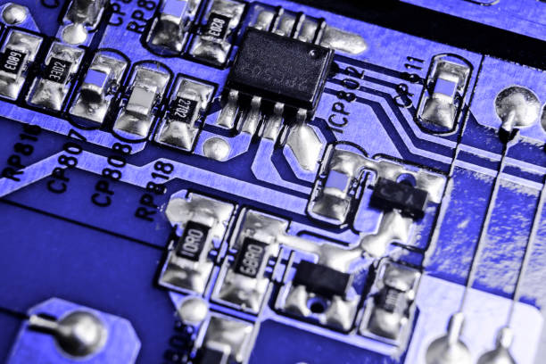 istock Macro shot of a Circuitboard with resistors microchips and electronic components. Computer hardware technology. Integrated communication processor. Information engineering. Semiconductor. PCB. Closeup 1015314998