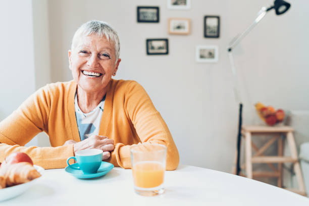 istock Cheerful senior woman at home 1015315768