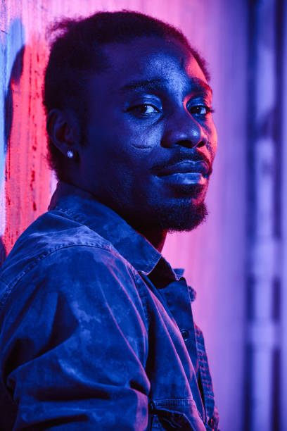 istock African-American man on neon light 1015315866