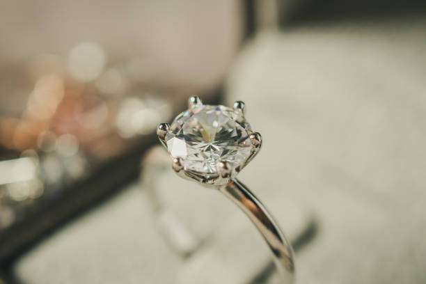 istock luxury engagement Diamond ring in jewelry gift box 1015320102