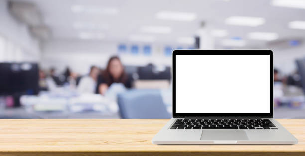 laptop with blank screen on desk table with blur office interior background - fundo de ecrã imagens e fotografias de stock