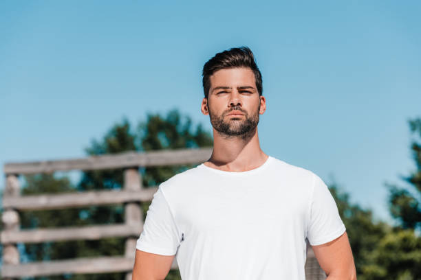 istock selective focus of confident soldier in white shirt on range 1015321490