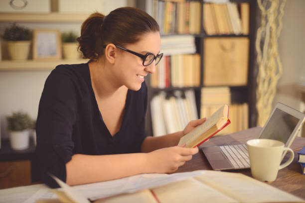 istock young woman working at home 1015335634