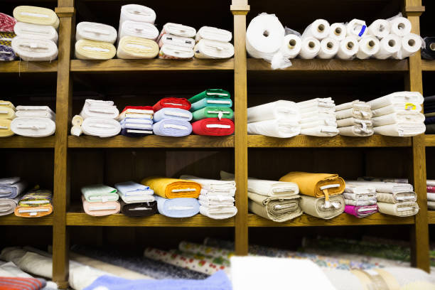 istock different fabric bolts exposed on shelves 1015345314