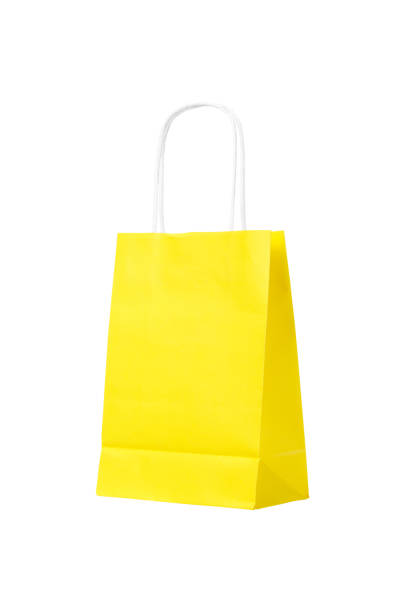 istock Ecological recycling Yellow shopping bag isolated on white background 1015345318
