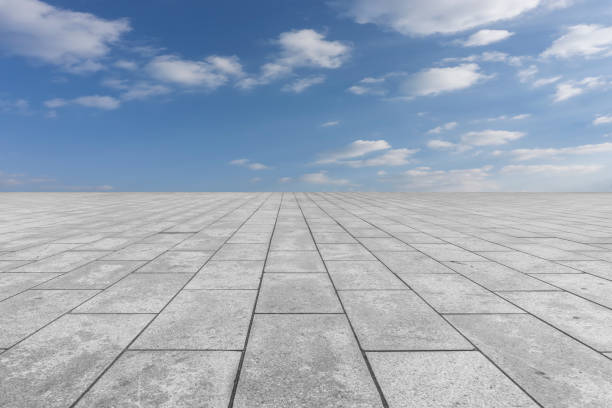istock Empty,square,floor,tiles,and,beautiful,sky,landscape 1015351384