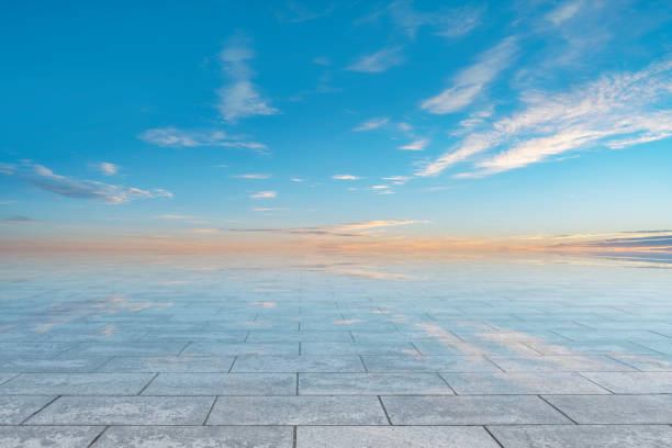 istock Empty,square,floor,tiles,and,beautiful,sky,landscape 1015351576