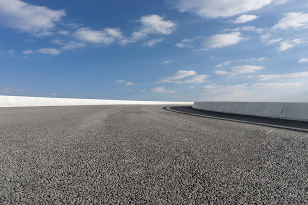 istock Empty,highway,asphalt,road,and,beautiful,sky,landscape 1015354454