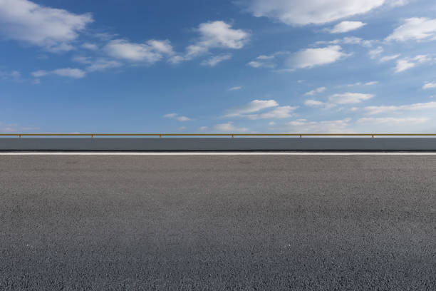 istock Empty,highway,asphalt,road,and,beautiful,sky,landscape 1015354654