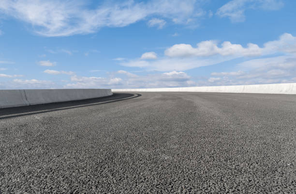 istock Empty,highway,asphalt,road,and,beautiful,sky,landscape 1015354754