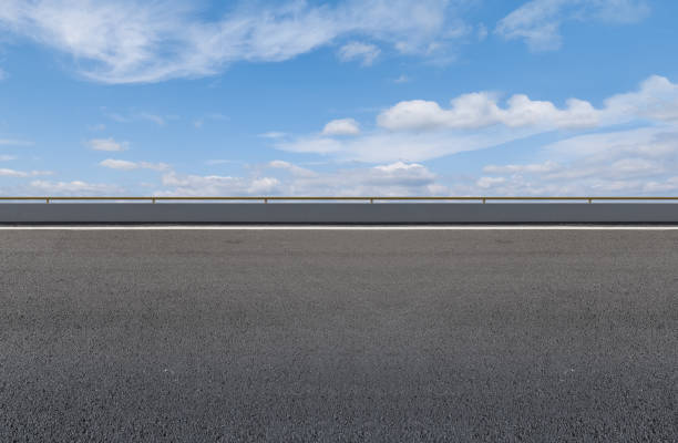 istock Empty,highway,asphalt,road,and,beautiful,sky,landscape 1015354784
