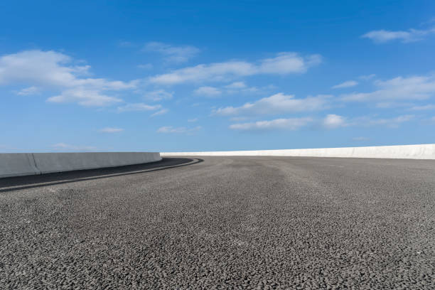 istock Empty,highway,asphalt,road,and,beautiful,sky,landscape 1015355052