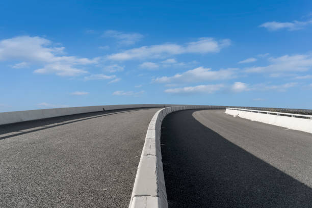 istock Empty,highway,asphalt,road,and,beautiful,sky,landscape 1015355090