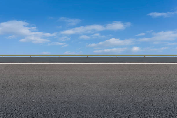 istock Empty,highway,asphalt,road,and,beautiful,sky,landscape 1015355248
