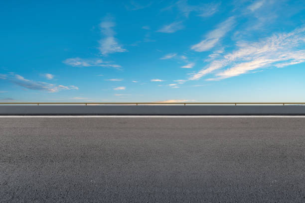 istock Empty,highway,asphalt,road,and,beautiful,sky,landscape 1015357332