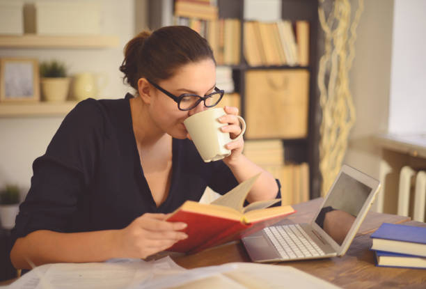 istock young woman working at home 1015358438