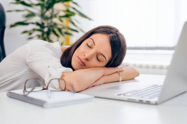 istock Tired woman in the office 1015375212