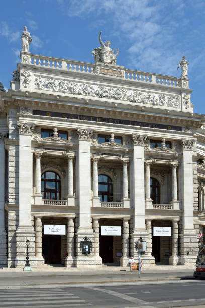 Burgtheater in Vienna - Austria. Vienna, Austria - June 18, 2018: The Burgtheater at the Ringstrasse in Vienna with main entrance is the Austrian National Theatre - Austria. burgtheater vienna stock pictures, royalty-free photos & images