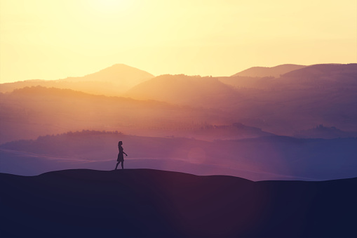 Single woman walking on the hill during sunset. Romantic scenic view. 3D illustration.