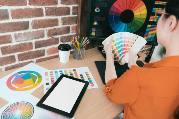 istock back view of graphic design company female worker 1015393468