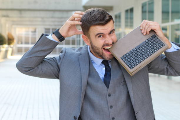 istock Male losing his mind because of technology 1015393922
