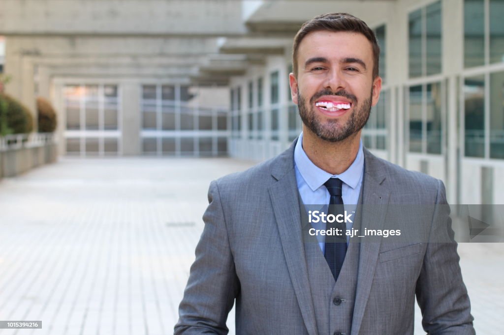Happy man with horrible teeth Happy man with horrible teeth. Businessman Stock Photo