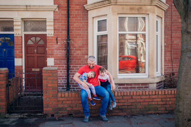 istock Posing for a Photograph with their Father 1015394484