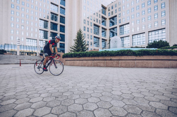 istock Guy on bicycle in city 1015399496