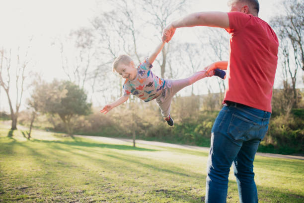 istock Lifting and Spinning his Son in the Air 1015399556