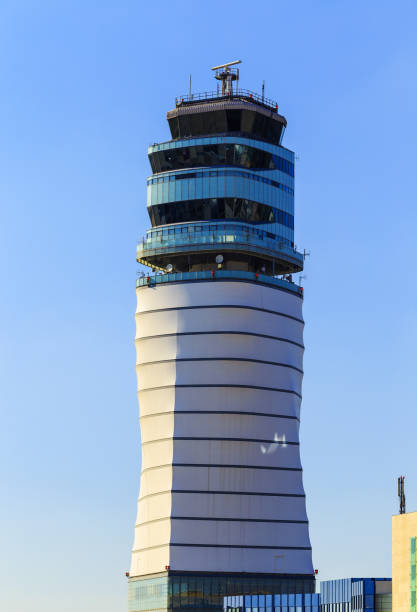 istock Air traffic control (ATC) tower on blue sky background 1015410824